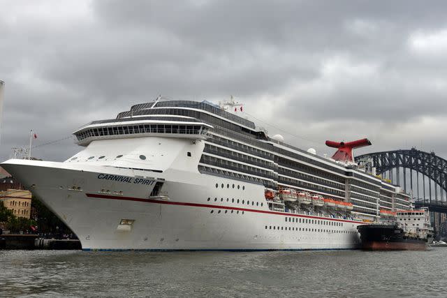 <p>PETER PARKS/AFP via Getty</p> The Carnival Spirit cruise ship is docked in Sydney Harbor in April 2015