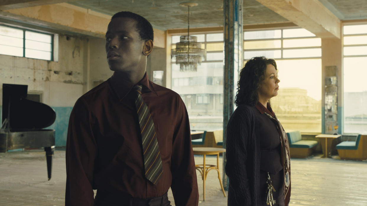 Micheal Ward and Olivia Colman play cinema employees in Sam Mendes drama Empire of Light. (Searchlight Pictures)