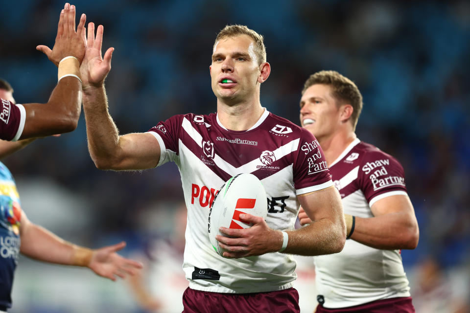 GOLD COAST, AUSTRALIA - APRIL 20: Tom Trbojevic of the Sea Eagles celebrates a try during the round seven NRL match between Gold Coast Titans and Manly Sea Eagles at Cbus Super Stadium, on April 20, 2024, in Gold Coast, Australia. (Photo by Chris Hyde/Getty Images)