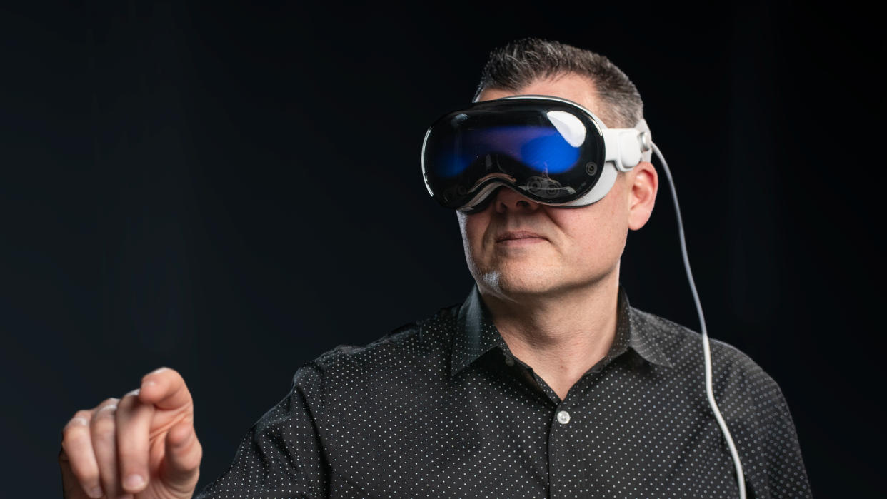  Man wearing Apple Vision Pro . 