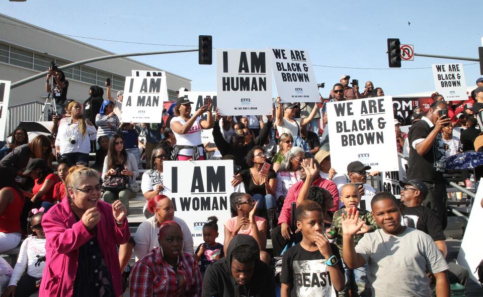 Activists hold Martin Luther King Day marches