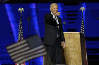 President-elect Joe Biden gestures on stage after speaking, Saturday, Nov. 7, 2020, in Wilmington, Del. (AP Photo/Andrew Harnik, Pool)