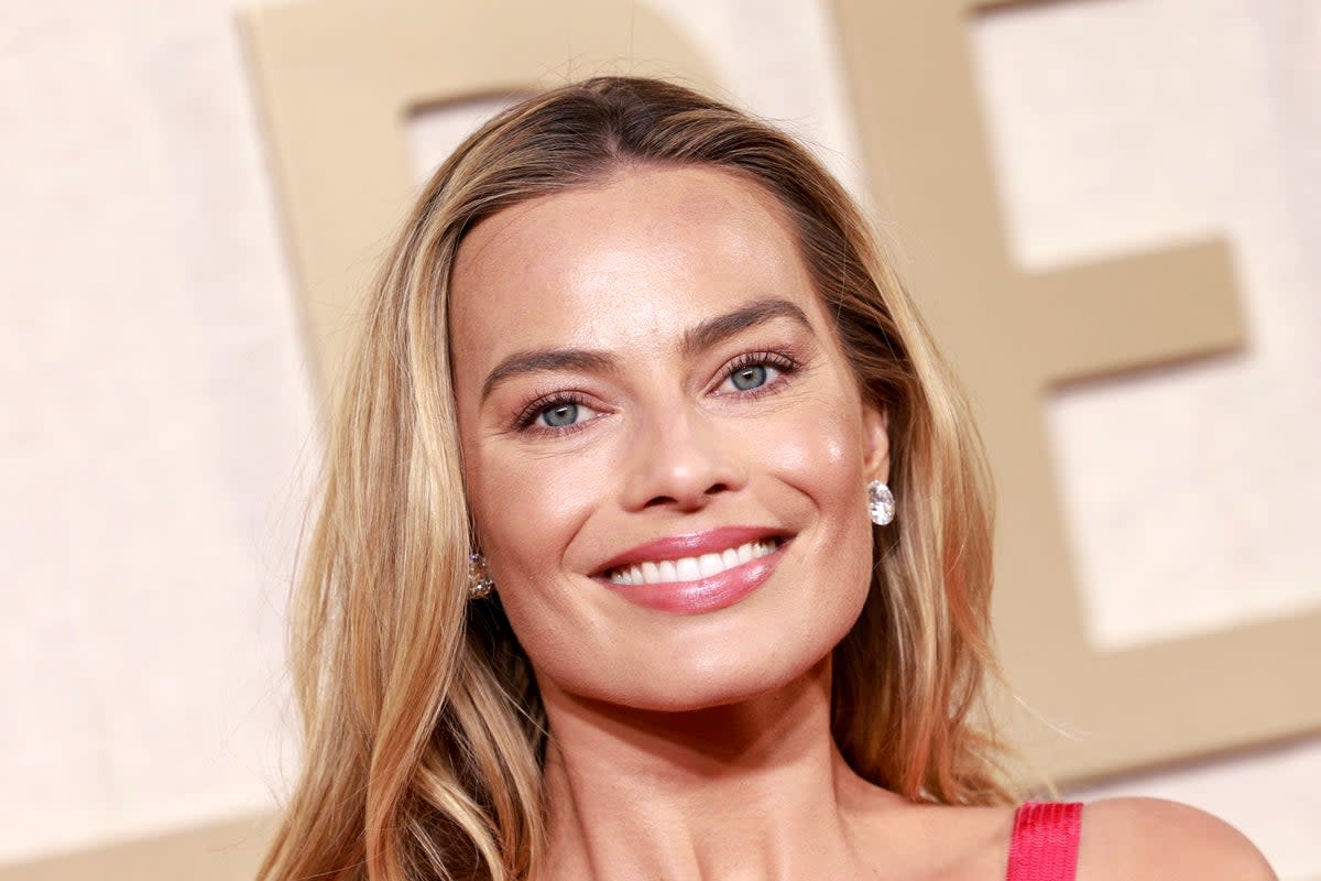 Margot Robbie says she wants to 'disappear' from the cameras after Barbie's success (AFP via Getty Images)