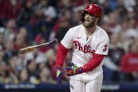 Philadelphia Phillies designated hitter Bryce Harper flies out during the =8 inning in Game 3 of the baseball NL Championship Series between the San Diego Padres and the Philadelphia Phillies on Friday, Oct. 21, 2022, in Philadelphia. (AP Photo/Matt Slocum)