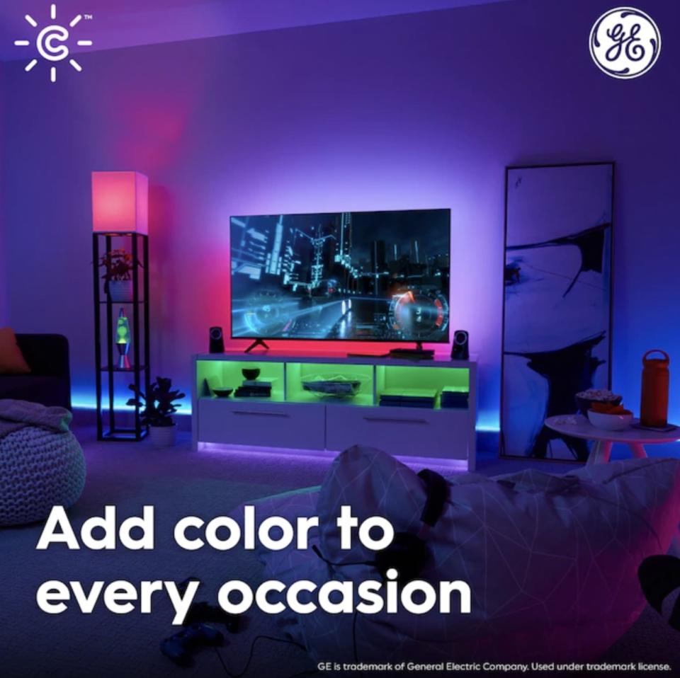 The lightbulbs in a lamp and under tv glowing red and green with caption "add color to every occasion"