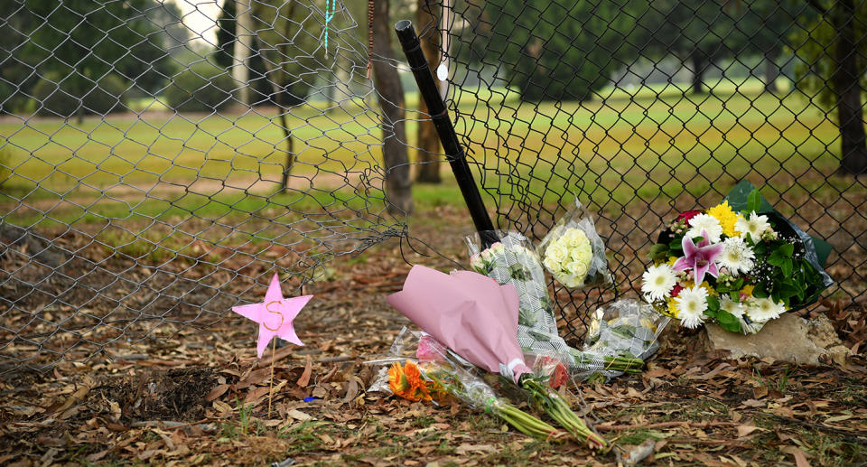 Flowers placed at the scene where seven children were hit on a footpath by a four-wheel drive in the Sydney suburb of Oatlands, Sunday, February 2, 2020. Four children have died and a fifth is in a critical condition after they were hit by a four-wheel drive while on the footpath in Sydney's northwest. (AAP Image/Joel Carrett) NO ARCHIVING