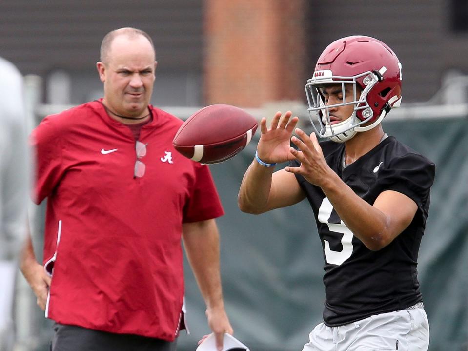 New offensive coordinator Bill O'Brien watches quarterback Bryce Young take a snap during practice. The Alabama Crimson Tide opened practice for the 2021 season as they prepare to defend the 2020 National Championship Friday, Aug. 6, 2021. [Staff Photo/Gary Cosby Jr.]