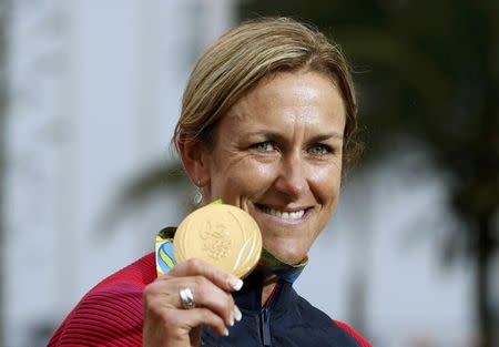 2016 Rio Olympics - Cycling Road - Victory ceremony - Women's Individual Time Trial Victory ceremony - Pontal - Rio de Janeiro, Brazil - 10/08/2016. Kristin Armstrong (USA) of USA poses with her gold medal. REUTERS/Eric Gaillard