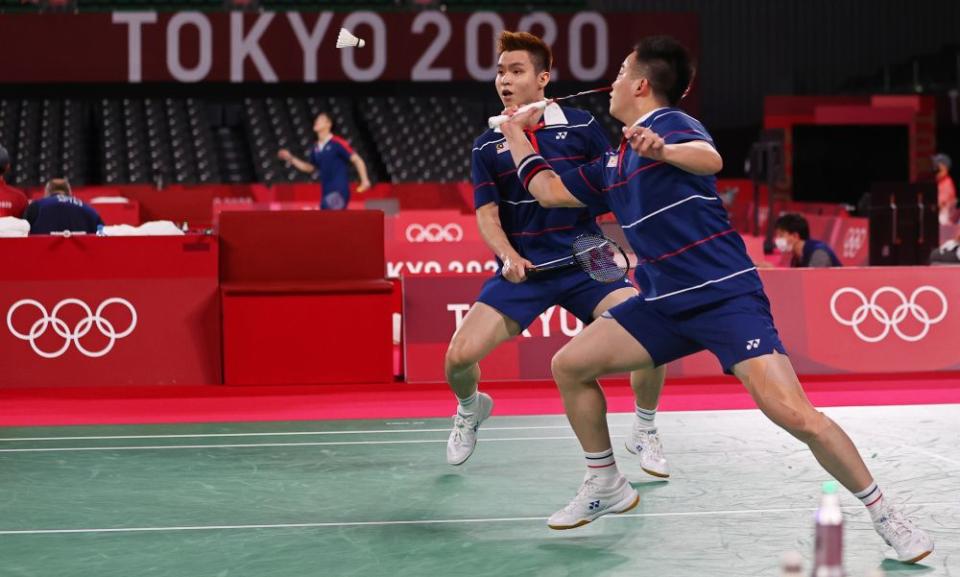 Aaron Chia of Malaysia in action as Soh Wooi Yik looks on during the match against Marcus Fernaldi Gideon and Kevin Sanjaya Sukamuljo of Indonesia at the Musashino Forest Sport Plaza, Tokyo July 29, 2021. — Reuters pic