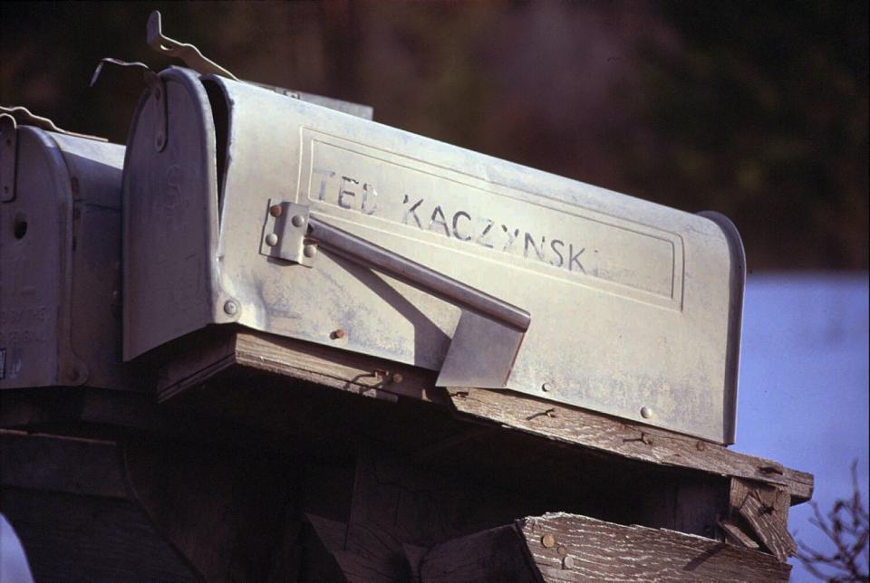 Ted Kaczynski's mailbox with faded lettering spelling his name.