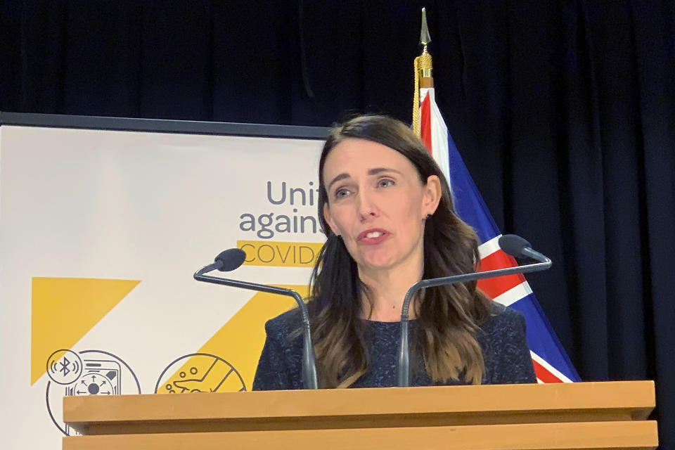 New Zealand's Prime Minister Jacinda Ardern talks to media in Wellington, New Zealand Monday, Feb. 15, 2021. As people in Auckland adjusted to a new lockdown on Monday, health officials said they'd found no evidence the coronavirus had spread further in the community, raising hopes the restrictions might be short-lived. (AP Photo/Nick Perry)