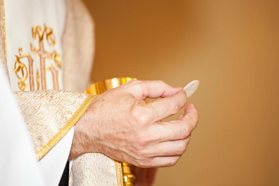 Roman Catholics believe that the bread and wine served at the Eucharist are converted into the body and blood of Christ through a process called transubstantiation