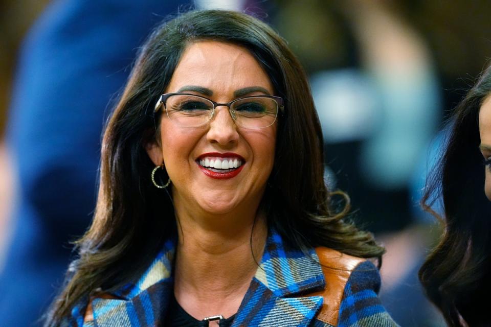 Boebert smiles before the first Republican primary debate for the 4th Congressional district in January in Fort Lupton, Colorado; her move to an already-crowded Republican primary caused rancor within some factions the party (AP)