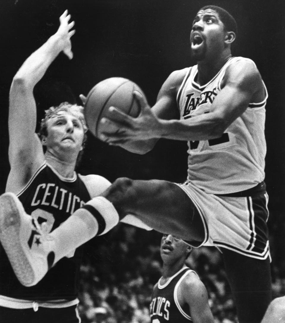 BOSTON - JUNE 10: The Lakers' Magic Johnson drives past the Celtics' Larry Bird in third quarter action as the Boston Celtics platt the Los Angeles Lakers at Boston Garden on June 10, 1984. (Photo by Stan Grossfeld/The Boston Globe via Getty Images)