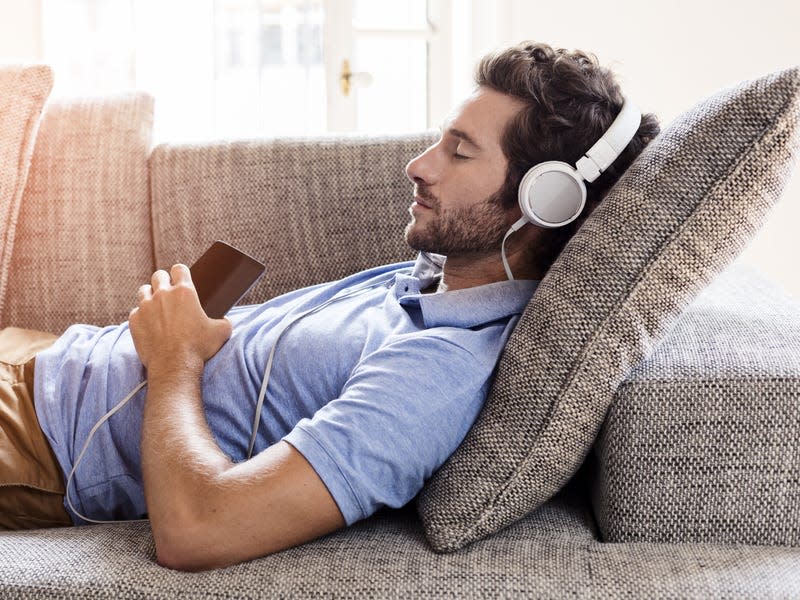 man sleeping headphones