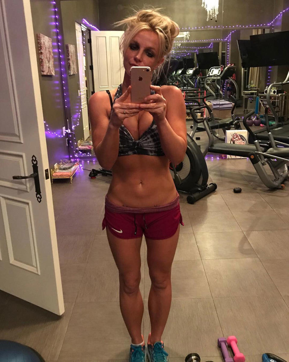 <p>The queen of pop proved all workouts are better with teeny tiny booty shorts and neon purple rope lights.</p>