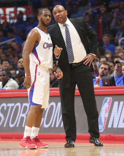 Doc Rivers tells Chris Paul to start looking for an apartment. (Stephen Dunn/Getty Images)