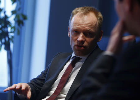 FILE PHOTO: Clemens Fuest, Co-Director of the Centre for European Economic Research (ZEW) speaks during an interview with Reuters in Frankfurt February 10, 2014. REUTERS/Ralph Orlowski