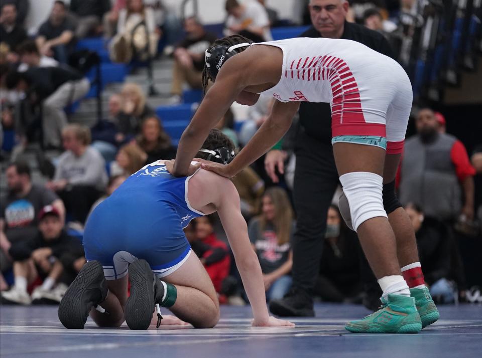 North RocklandÕs Amari Payton wrestles Pearl RiverÕs Declan O'Meara in the 131-pound championship match at the Rockland County Wrestling Championships at Suffern High School on Saturday, Jan. 20, 2024.