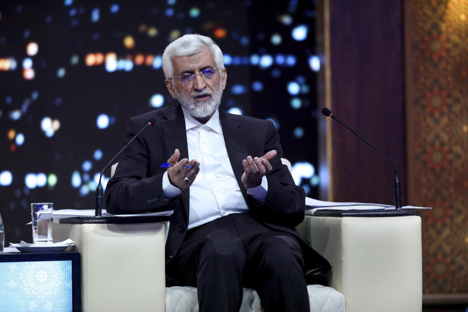 In this picture made available by Iranian state-run TV, IRIB, presidential candidate for June 28, election Saeed Jalili, former Iran's top nuclear negotiator, speaks in a debate of the candidates at the TV studio in Tehran, Iran, Monday, June 17, 2024. (Morteza Fakhri Nezhad/IRIB via AP)