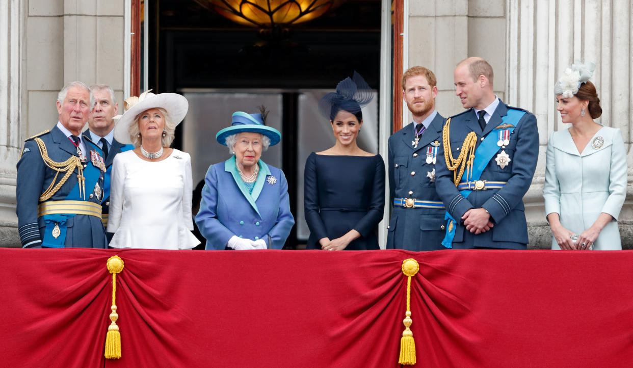 LONDON, UNITED KINGDOM - JULY 10: (EMBARGOED FOR PUBLICATION IN UK NEWSPAPERS UNTIL 24 HOURS AFTER CREATE DATE AND TIME) Prince Charles, Prince of Wales, Prince Andrew, Duke of York, Camilla, Duchess of Cornwall, Queen Elizabeth II, Meghan, Duchess of Sussex, Prince Harry, Duke of Sussex, Prince William, Duke of Cambridge and Catherine, Duchess of Cambridge watch a flypast to mark the centenary of the Royal Air Force from the balcony of Buckingham Palace on July 10, 2018 in London, England. The 100th birthday of the RAF, which was founded on on 1 April 1918, was marked with a centenary parade with the presentation of a new Queen's Colour and flypast of 100 aircraft over Buckingham Palace. (Photo by Max Mumby/Indigo/Getty Images)