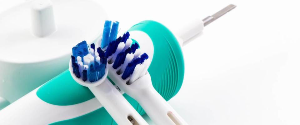 soft focus toothbrush electric, Dental care tools on white background.