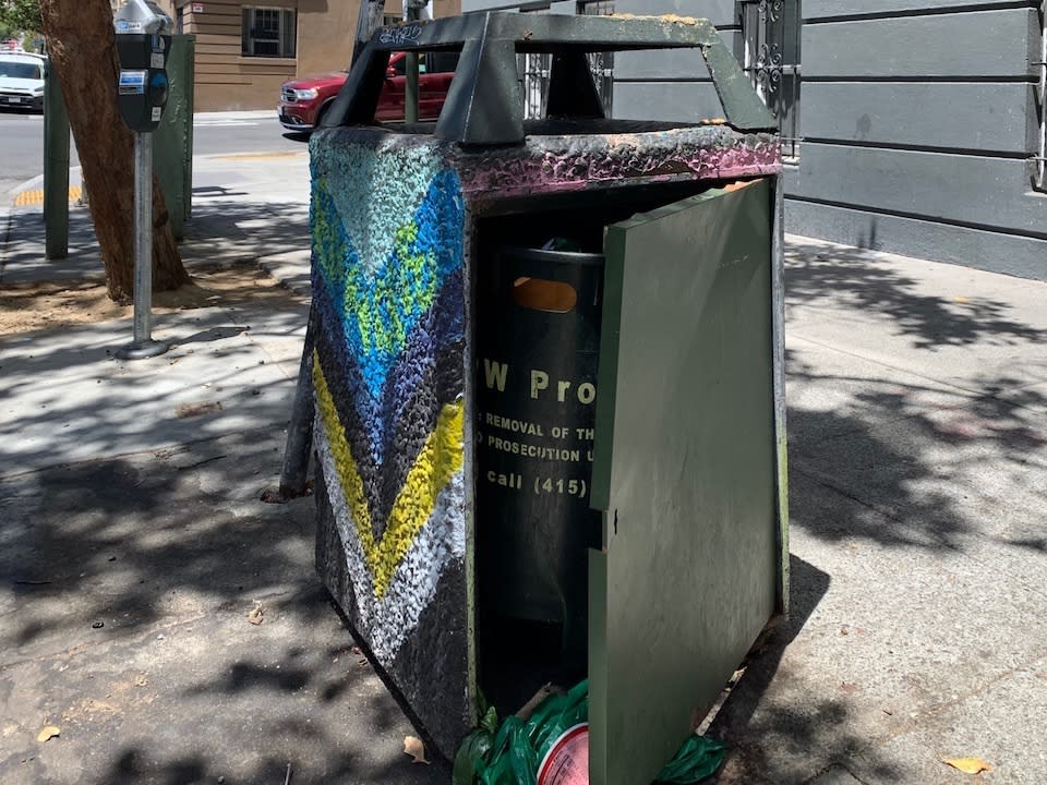 Older Public Works trash cans often aren't properly secured, and overflow onto the sidewalks.