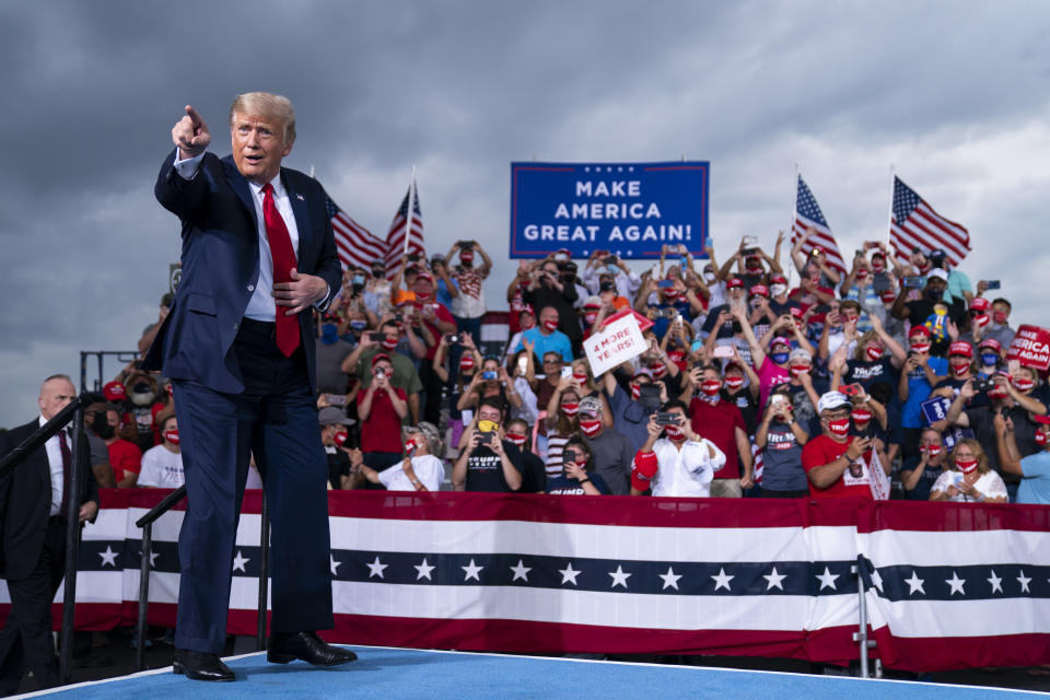 FILE - In this Sept. 8, 2020, file photo, President Donald Trump arrives to speak at a campaign rally at Smith Reynolds Airport in Winston-Salem, N.C. (AP Photo/Evan Vucci, File)