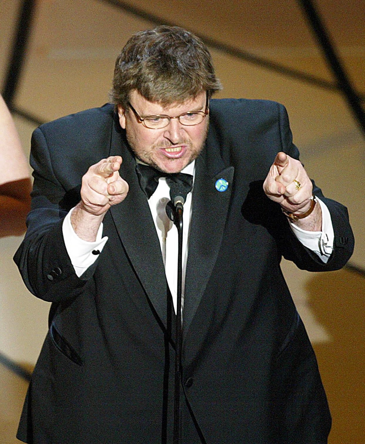 Michael Moore accepts his Oscar for Documentary Feature for 