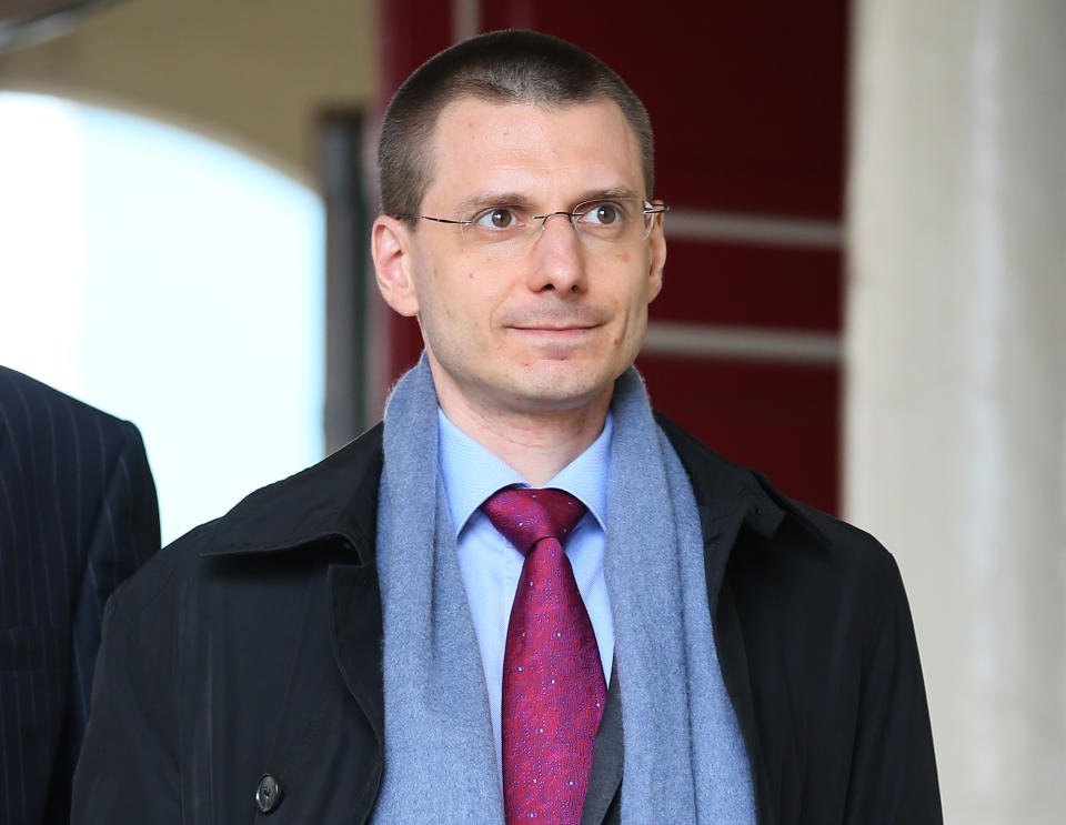 Michael Cotick lawyer of the late Russian oligarch Boris Berezovsky arrives at Windsor Coroners Court, for his inquest in Windsor, England, Wednesday, March, 26, 2014. Berezovsky who changed his name to Platon Elenin died at his home near Windsor in March 2013.(AP Photo/Alastair Grant)