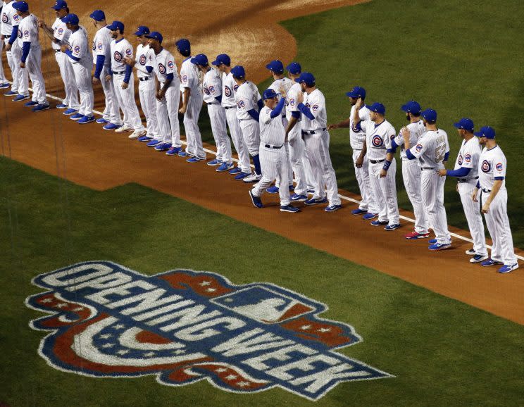 The Cubs celebrating their World Series win in front of the home fans Monday. (AP Photo)