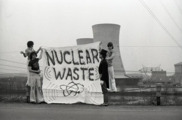 With one man dressed in an undertaker's outfit, a group of people unfurl a protest banner in front of the cooling towers at the Three Mile Island nuclear plant near Harrisburg, Pennsylvania, on April 1, 1979. (Photo: Bettmann via Getty Images)