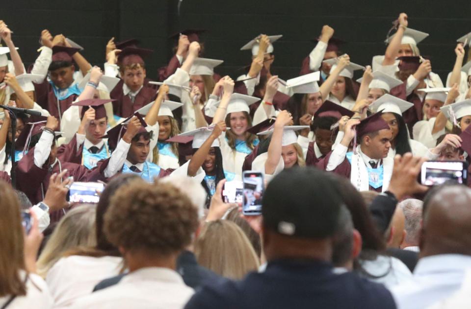 Graduates move their tassels as Caravel Academy honors the 88 members of the Class of 2023 with its 41st commencement, Wednesday, June 7, 2023.