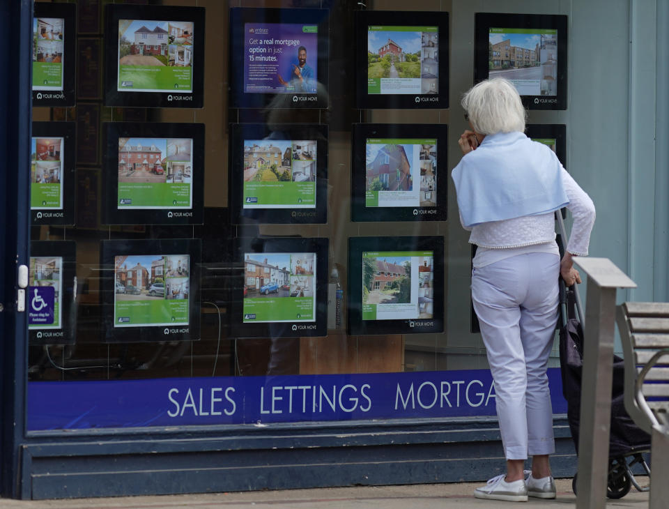 A woman looking at advertisements in an estate agents window in Faversham, Kent. Picture date: Thursday July 20, 2023. (Photo by Yui Mok/PA Images via Getty Images)
