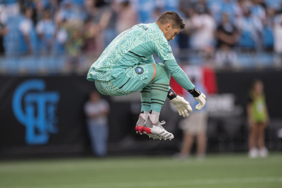 Charlotte FC goalkeeper Kristijan Kahlina (1) jumps prior to the first half of an MLS soccer match against Orlando City, Sunday, Aug. 21, 2022, in Charlotte, N.C. (AP Photo/Matt Kelley)