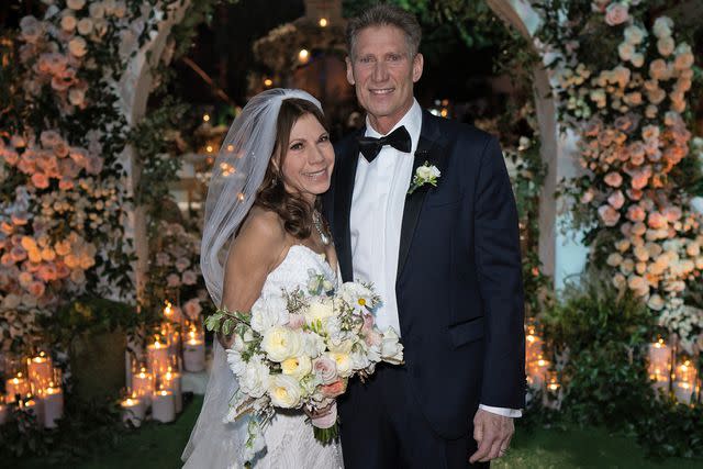 <p>John & Joseph Photography/Disney via Getty</p> Theresa Nist and Gerry Turner on their Jan. 4 wedding day