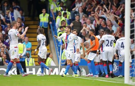 Football - Chelsea v Crystal Palace - Barclays Premier League - Stamford Bridge - 29/8/15 Joel Ward (C) celebrates with team mates after scoring the second goal for Crystal Palace Reuters / Paul Hackett Livepic