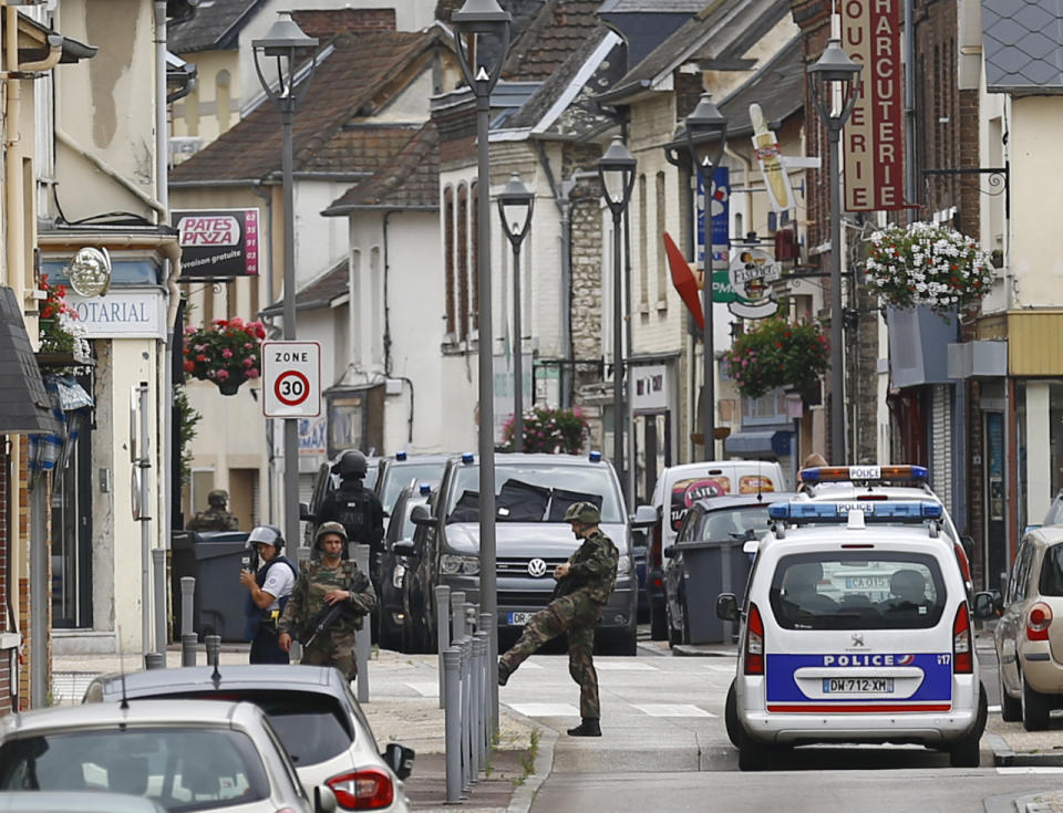 <p>French soldiers stand guard near the scene of an attack in Saint-Etienne-du-Rouvray, Normandy, France, Tuesday, July 26, 2016. (AP Photo/Francois Mori)</p>