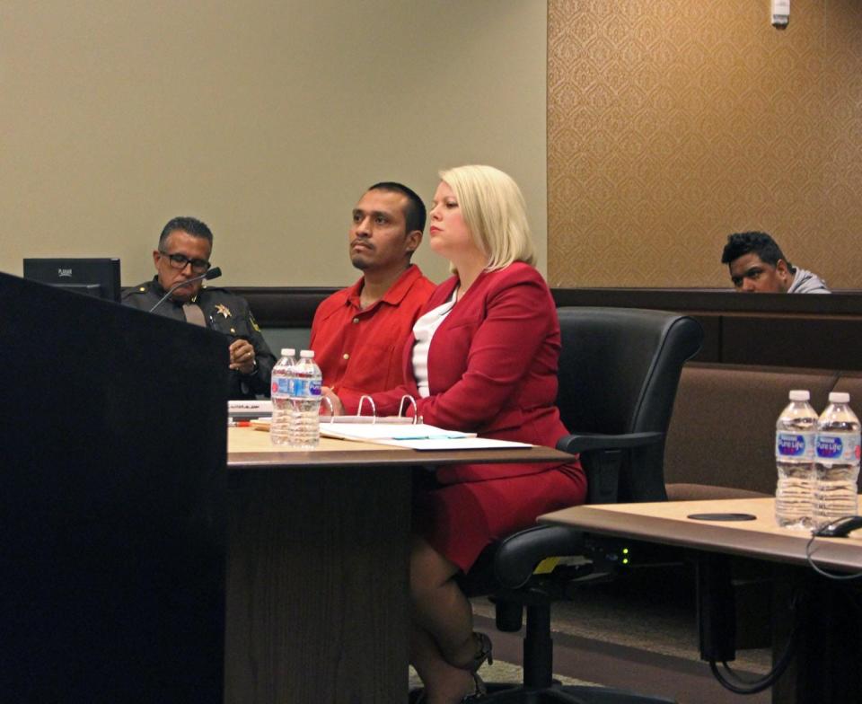 Holland murderer Juan Nunez sits with his attorney, Nichole Derks, during his resentencing hearing in Grand Haven on Tuesday, April 23, 2019.