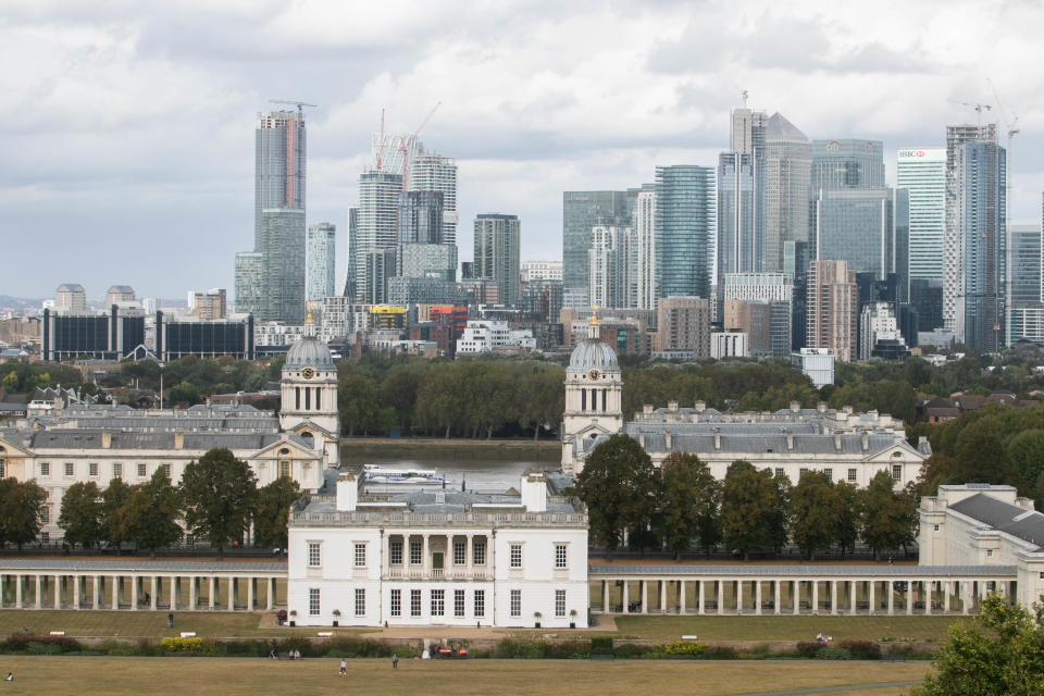 A view of the Greenwich old naval college at the foreground and Canary Wharf skyline and financial district in London. (Photo by Amer Ghazzal / SOPA Images/Sipa USA)