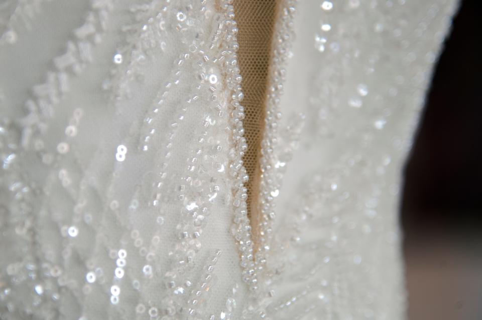 A detail of a wedding dress at Sheryl Giles Bridal Couture in Lincoln Center in Stockton on Apr. 23, 2024.