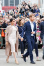 <p>For a walkabout in Auckland on October 30, Meghan changed into a bespoke Brandon Maxwell dress with a Burberry trench and her go-to £294 Stuart Weitzman pumps to finish. <em>[Photo: Getty]</em> </p>