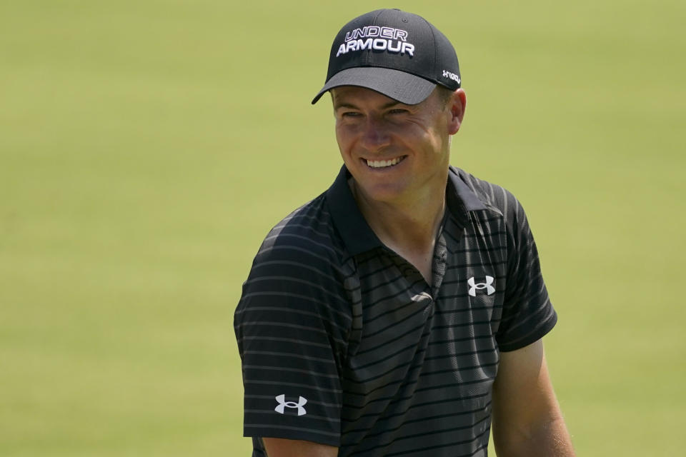 Jordan Spieth smiles on the driving range at the PGA Championship golf tournament, Wednesday, May 18, 2022, in Tulsa, Okla. (AP Photo/Sue Ogrocki)