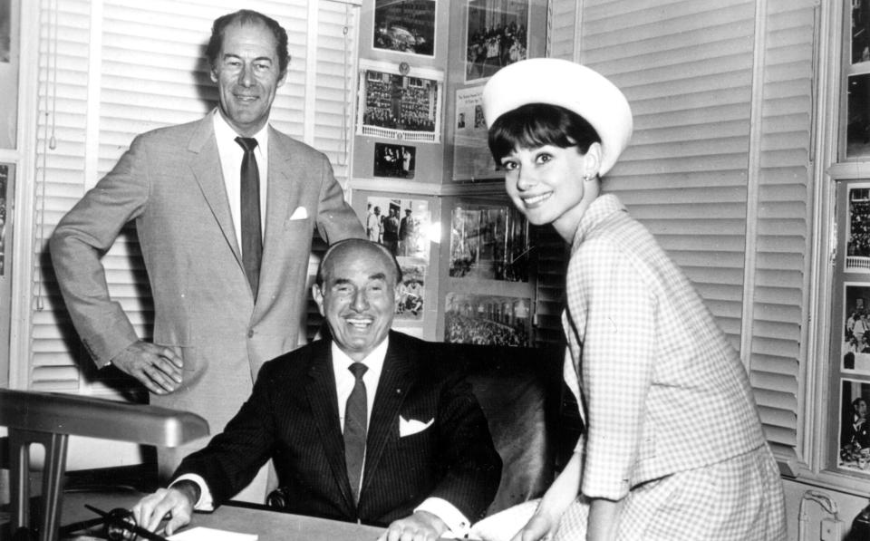 Warner Bros boss Jack Warner (with Rex Harrison and Audrey Hepburn), who would regularly fire people just because it was Tuesday - Getty