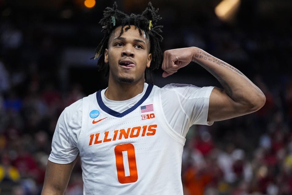 Illinois guard Terrence Shannon Jr. (0) reacts after hitting a basket and being fouled by Duquesne in the first half of a second-round college basketball game in the NCAA Tournament, Saturday, March 23, 2024, in Omaha, Neb. (AP Photo/Charlie Neibergall)