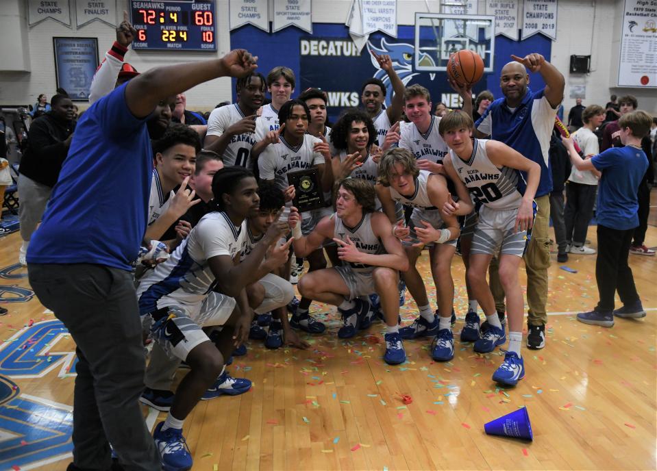 Stephen Decatur's Boys Basketball team defeated Northeast 72-60 on Mar. 2, winning the Class 3A South Region II Championship and advancing to the state quarterfinal.