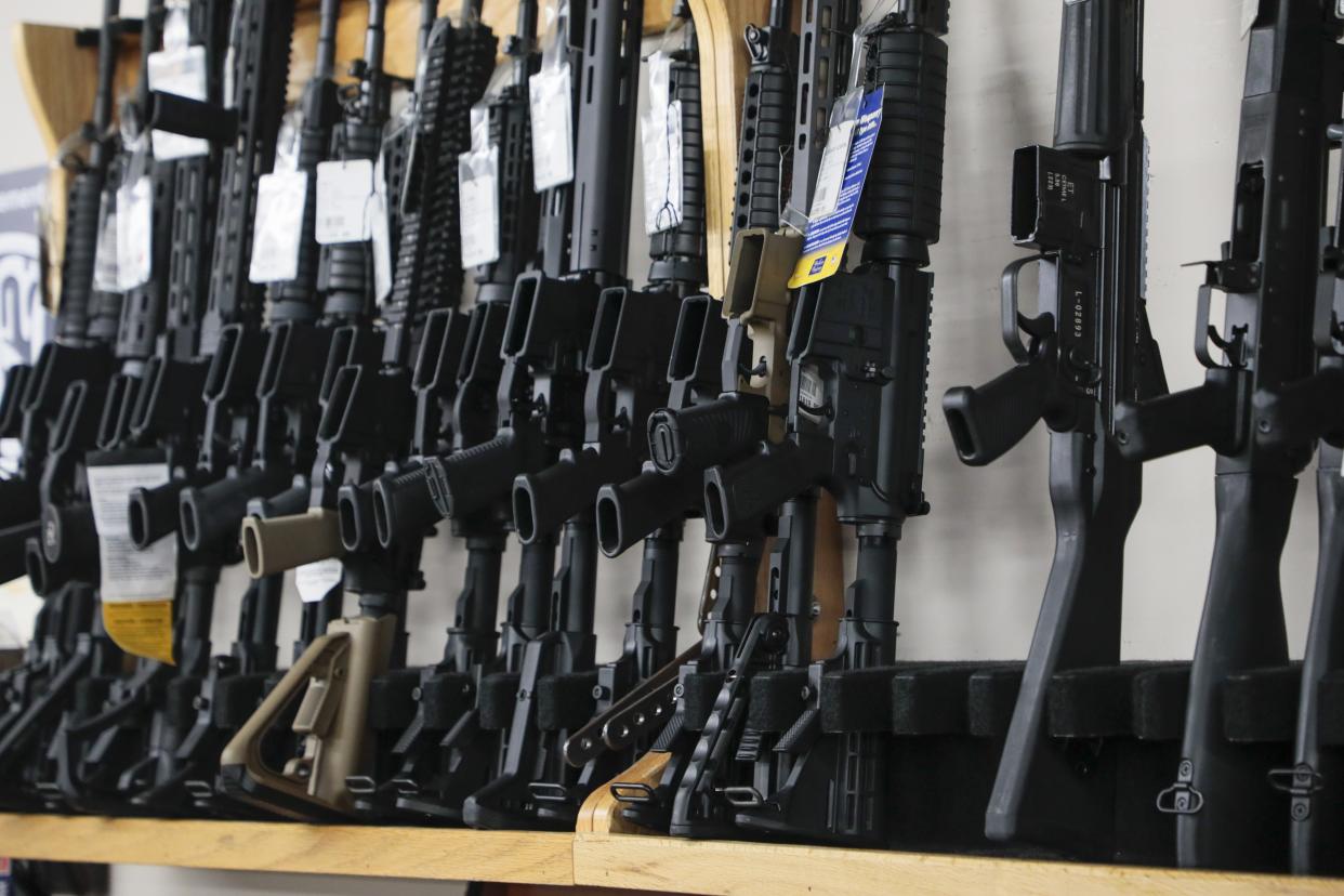 Defense lawyers are asking a judge to rule that the National Firearms Act of 1934 is unconstitutional as part of a case involving a device prosecutors said could convert semiautomatic rifles like these into full-automatic machine guns.