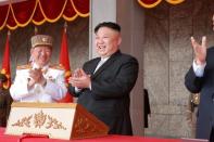 North Korean leader Kim Jong Un applauds during a military parade and a public procession of Pyongyang citizens celebrating the 105th birth anniversary of founder Kim Il Sung in this undated photo released by North Korea's Korean Central News Agency (KCNA) in Pyongyang on April 16, 2017. KCNA/via REUTERS