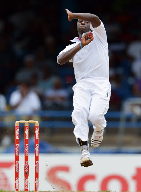 West Indies bowler Kemar Roach delivers during the first day of the second-of-three Test matches between Australia and West Indies April 15, 2012 at Queen's Park Oval in Port of Spain, Trinidad. AFP PHOTO/Stan HONDA