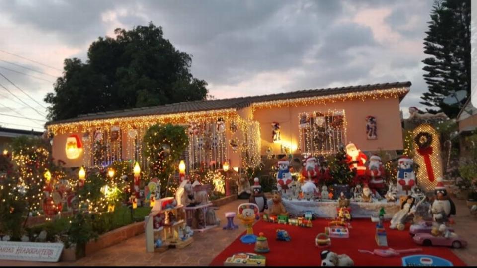 For 40 years, the Williams family has been delighting the community with a holiday display at their home at 1185 NW 47th Terrace in Miami. Santa surprises the children with toys and candy on Christmas Eve.